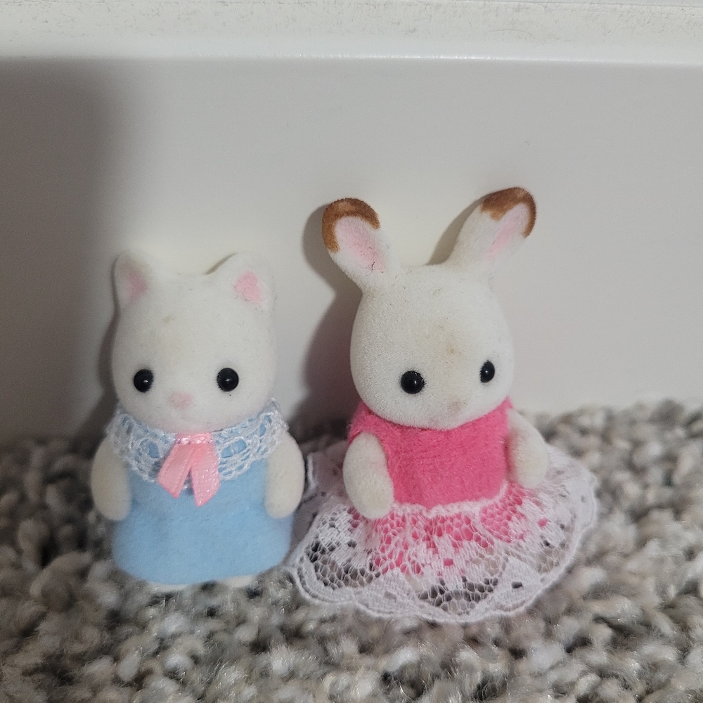 2 slightly dirty calico critters
